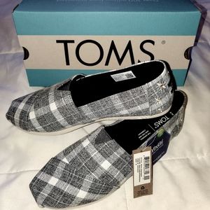 Brand new women's TOMS plaid shoes.
